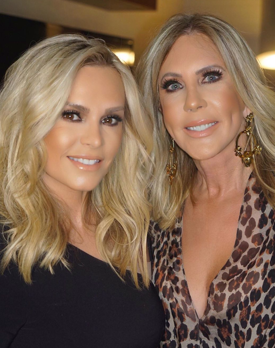 Tamra Judge and Vicki Gunvalson smile with nude lips and blonde hair.