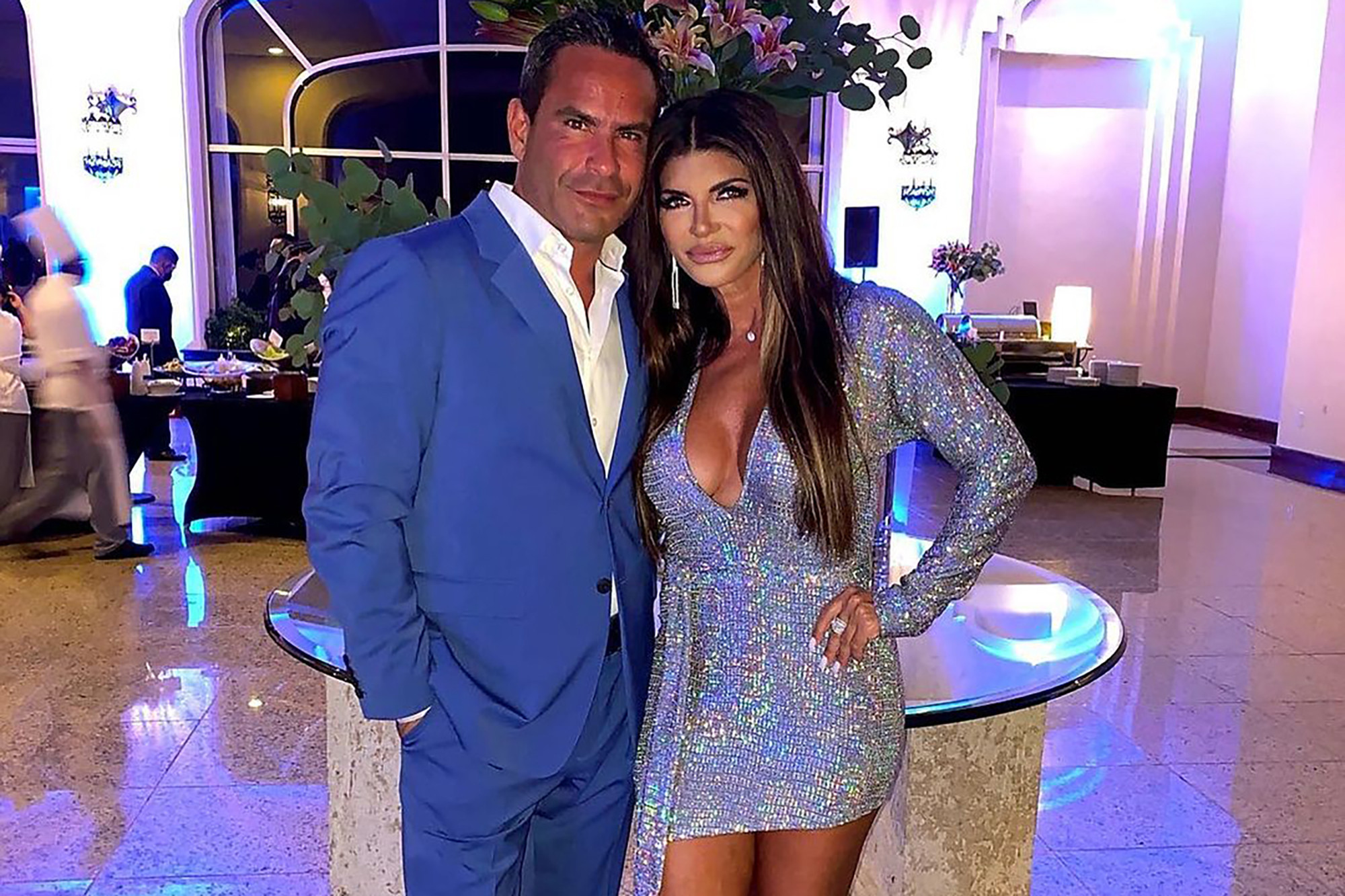 Teresa Giudice and Luis Ruelas wear blue.