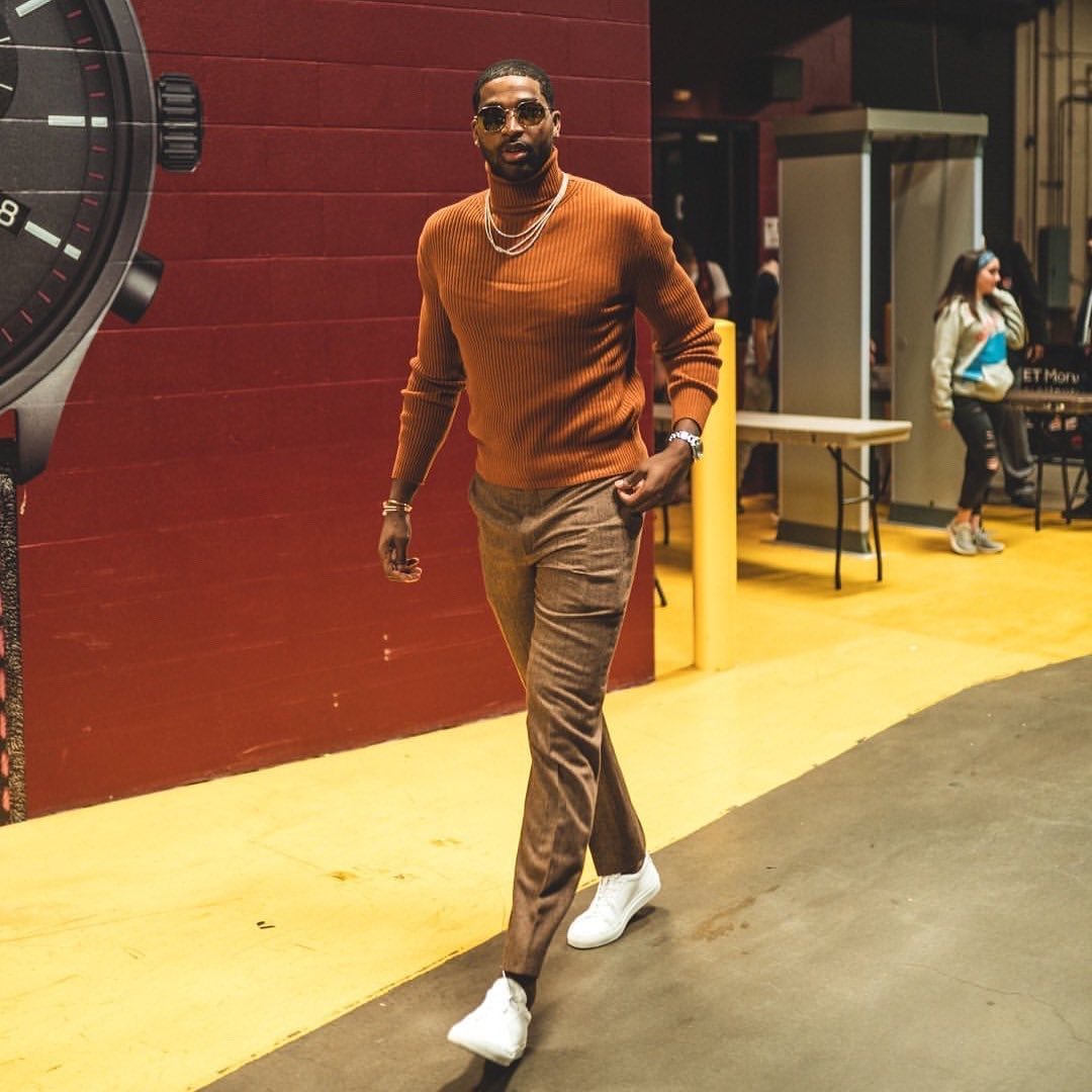 Tristan Thompson steps out in style, in a brown long sleeve, pant and white speakers. 