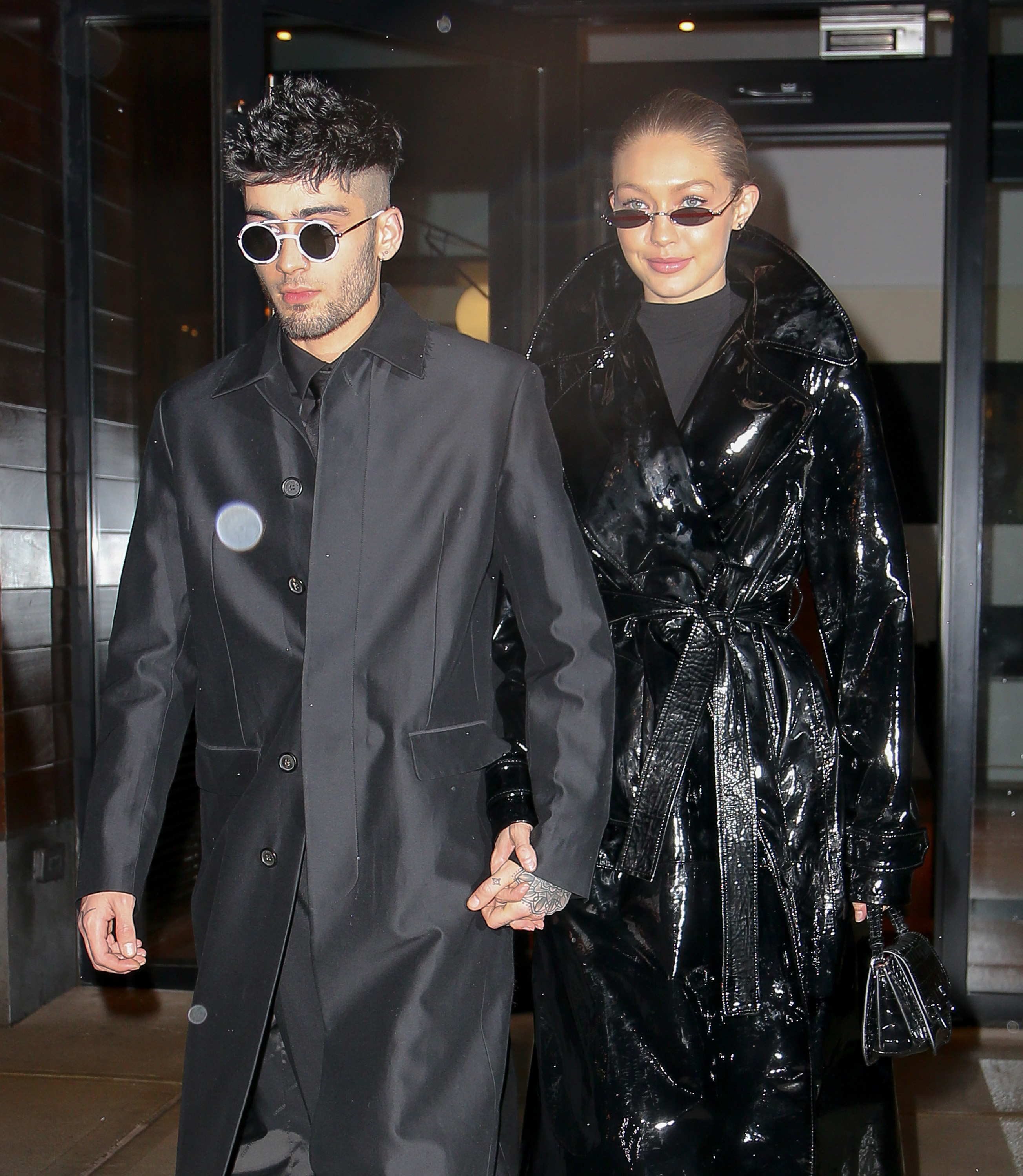 Zayn Malik and Gigi Hadid look amazing in this different shade of black outfits, while holding hands.