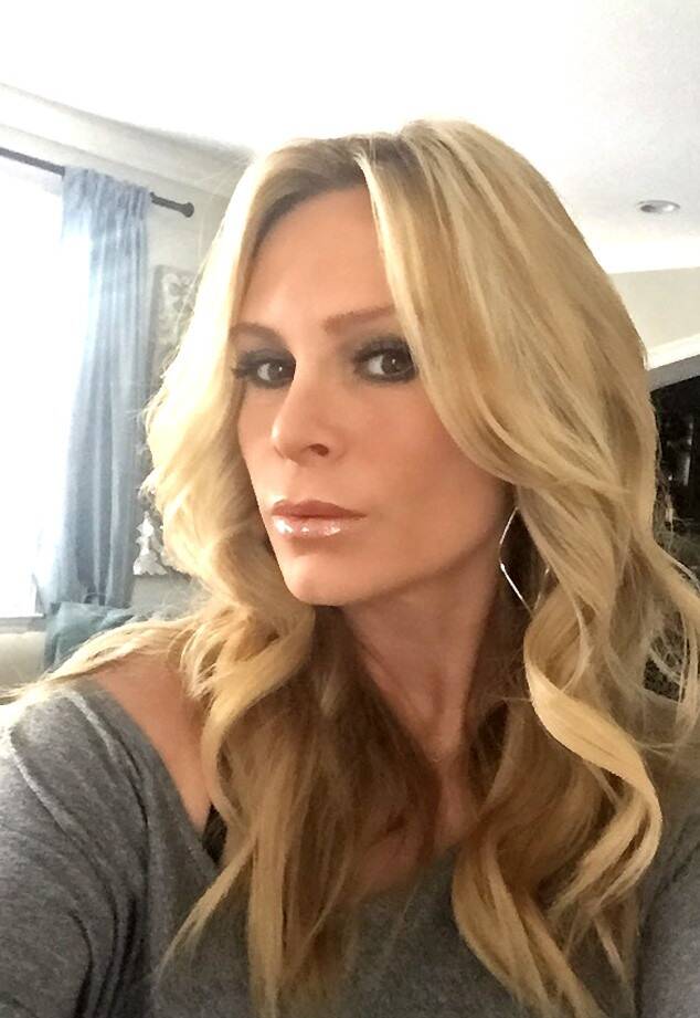 Tamra Judge takes a selfie with dangling earrings.