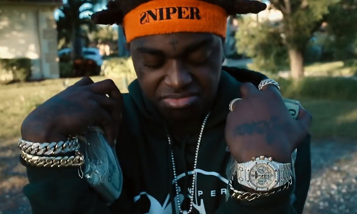 Kodak in the visuals for his ‘Cut Throat’ video.