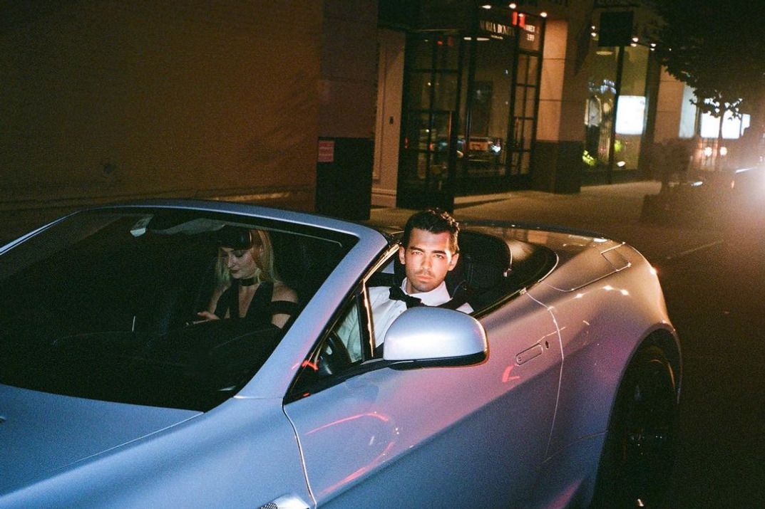 Joe Jonas in sports car