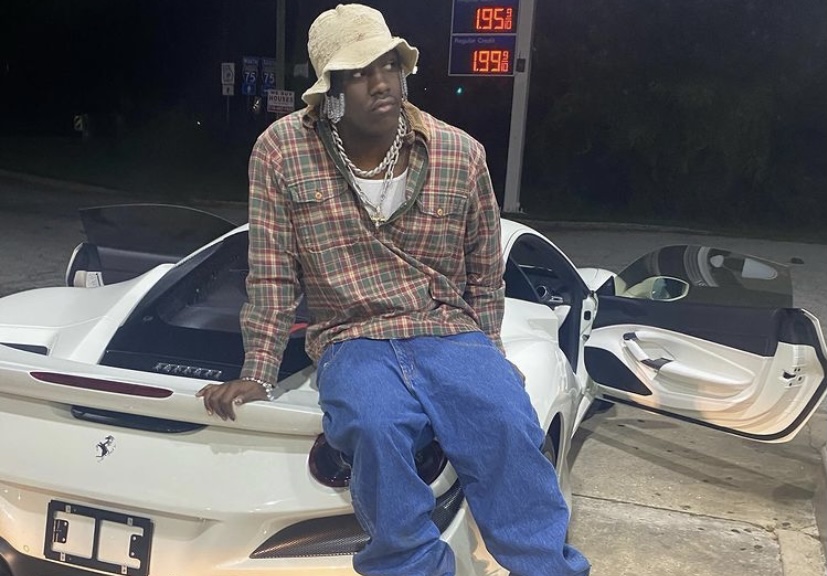 Yachty in front of one of his cars.