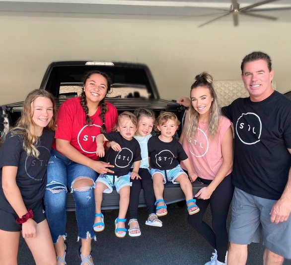 Jim Edmonds poses with his nanny, his daughters, and his twin boys.