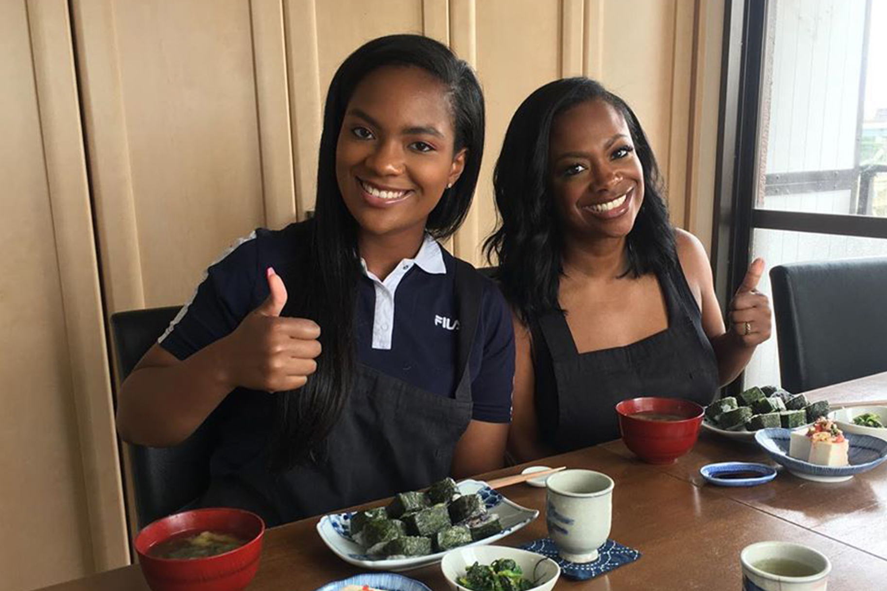 Kandi and daughter Riley eating at a resturant