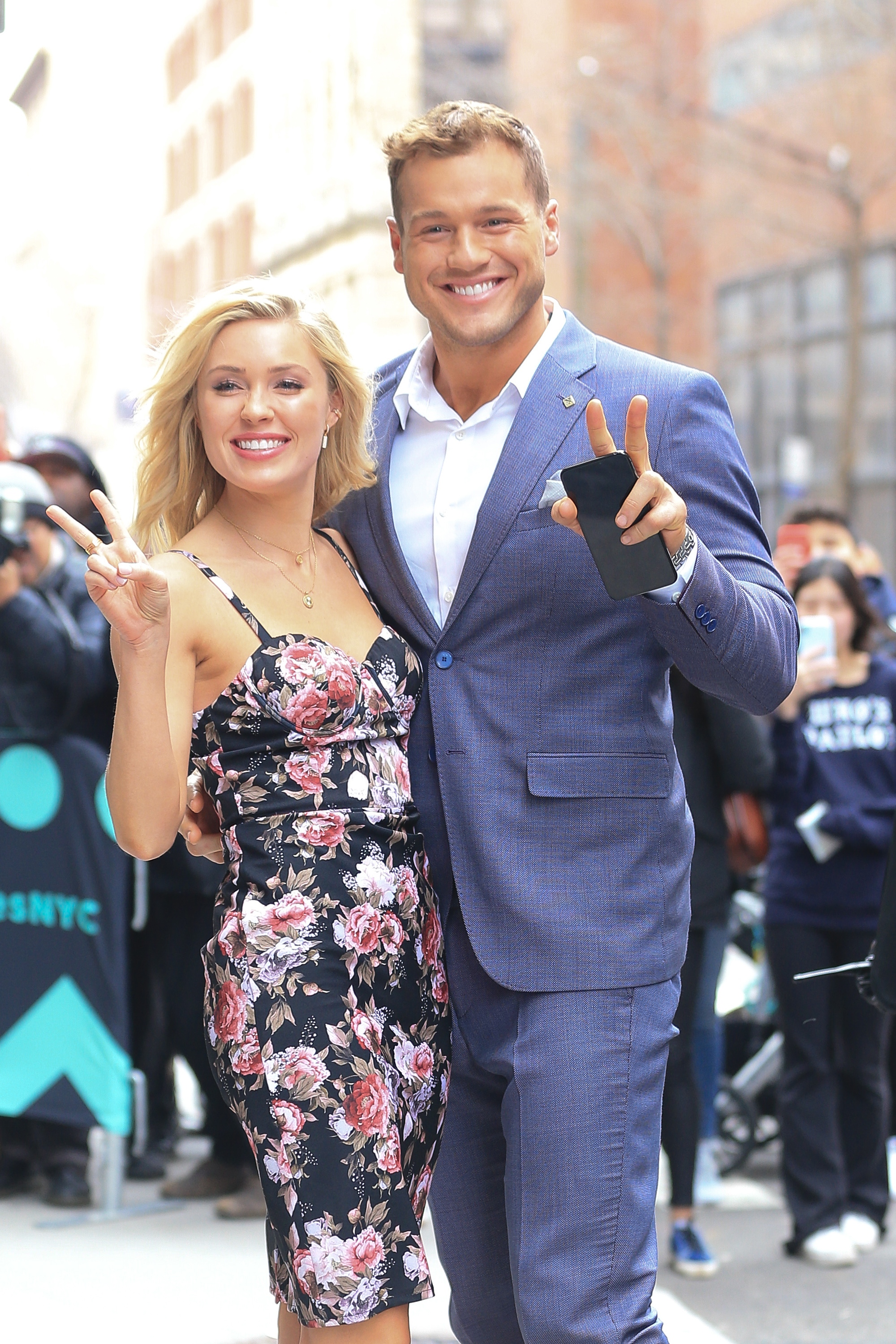 A photo showing Colton Underwood and Cassie Randolph posing for their fans at an event and they look incredible.