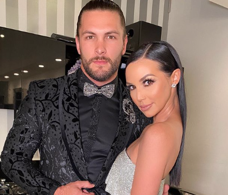 Scheana Shay and Brock Davies attend an event.