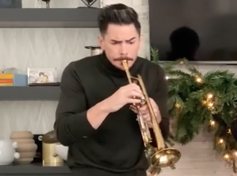 Tom Sandoval plays the trumpet.