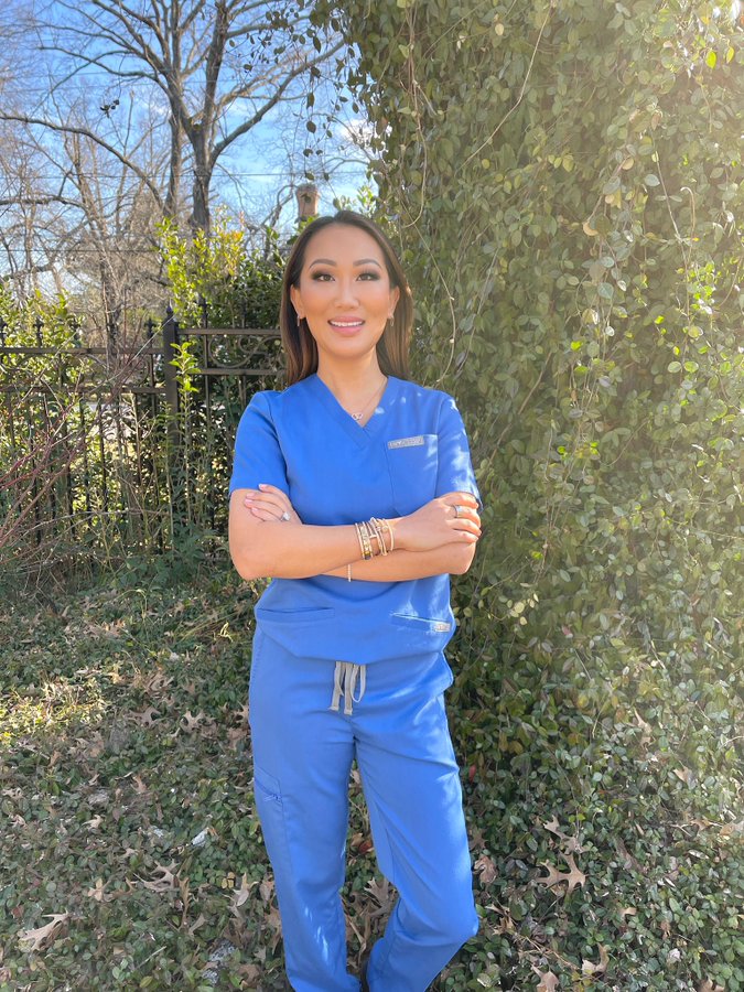 Dr. Tiffany Moon wears blue scrubs.