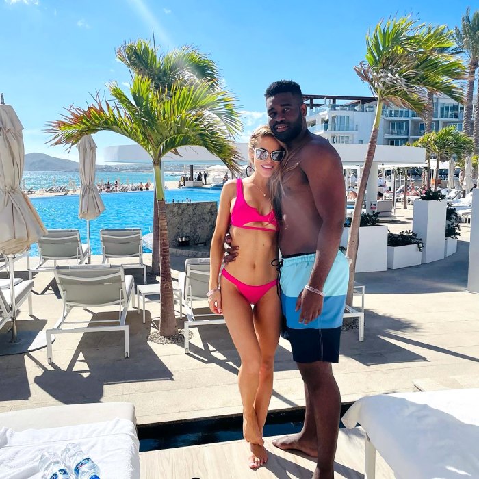 Chrishell Stause in pink bikini with shirtless Keo Motsepe.