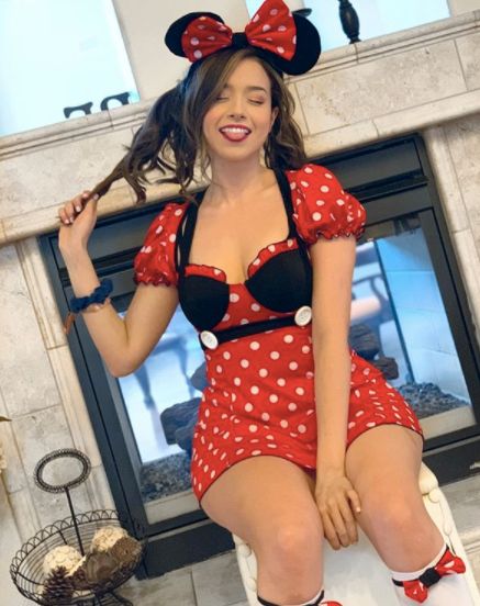 Game Pokimane at Disneyland with Minnie Mouse outfit. 