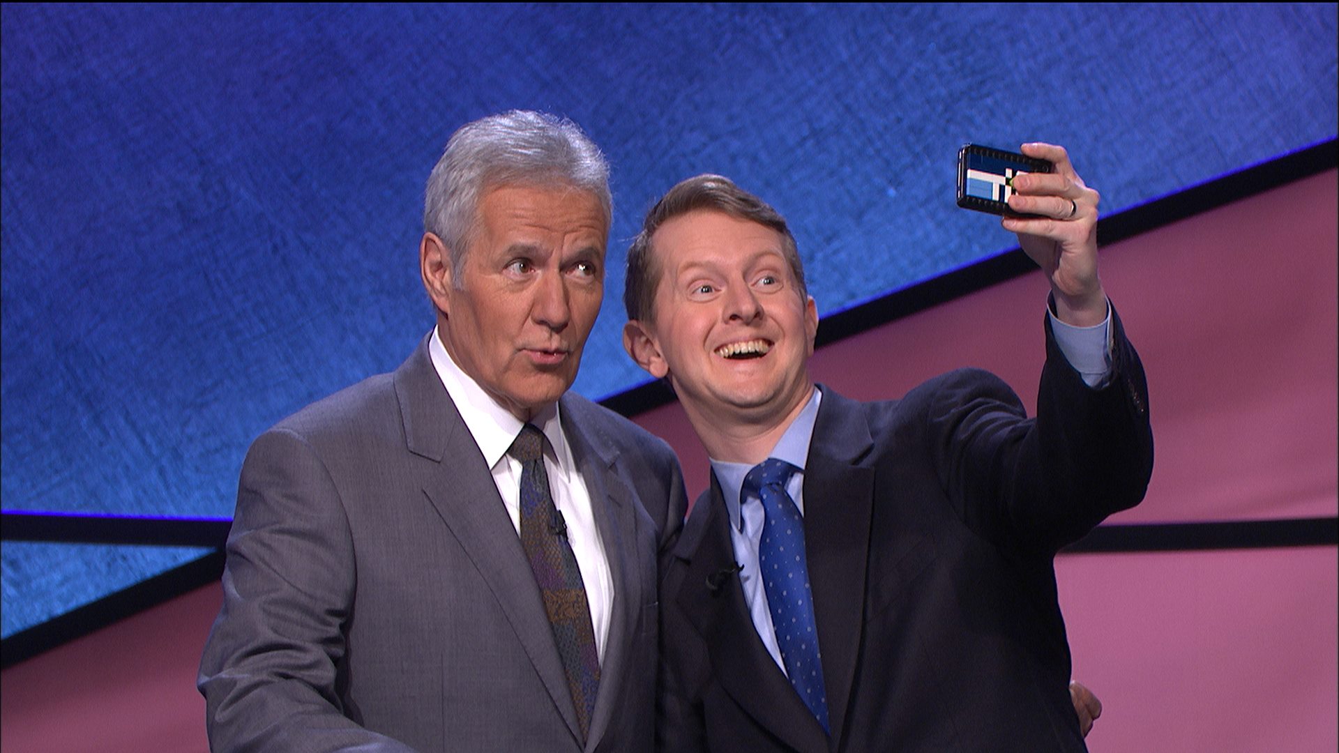 Ken Jennings smiles for a selfie with late host Alex Trebek.