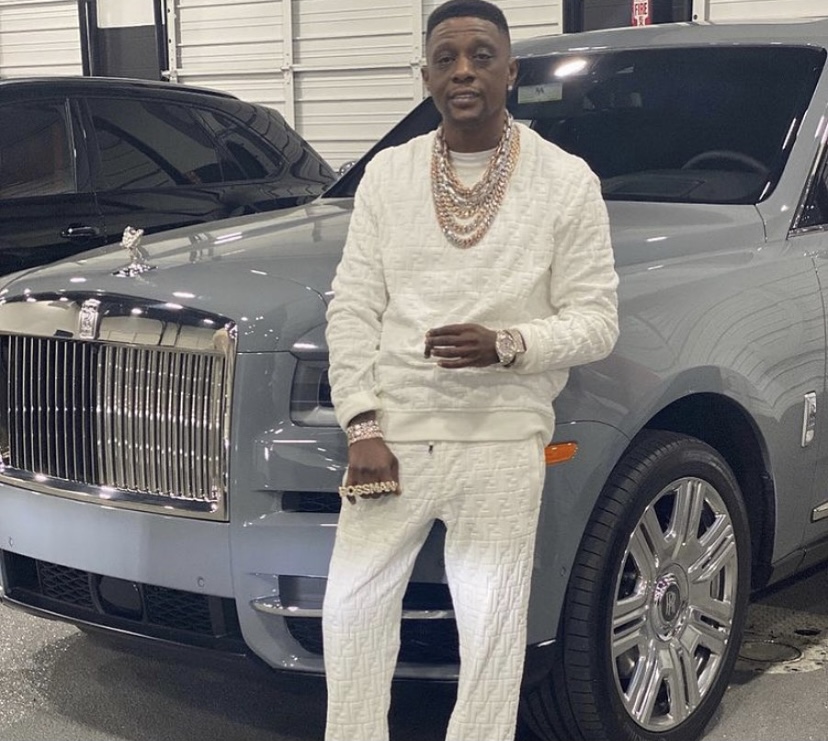 Boosie in front of his Rolls Royce.