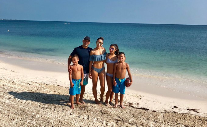 Melissa Gorga wears a bikini at the beach with family.