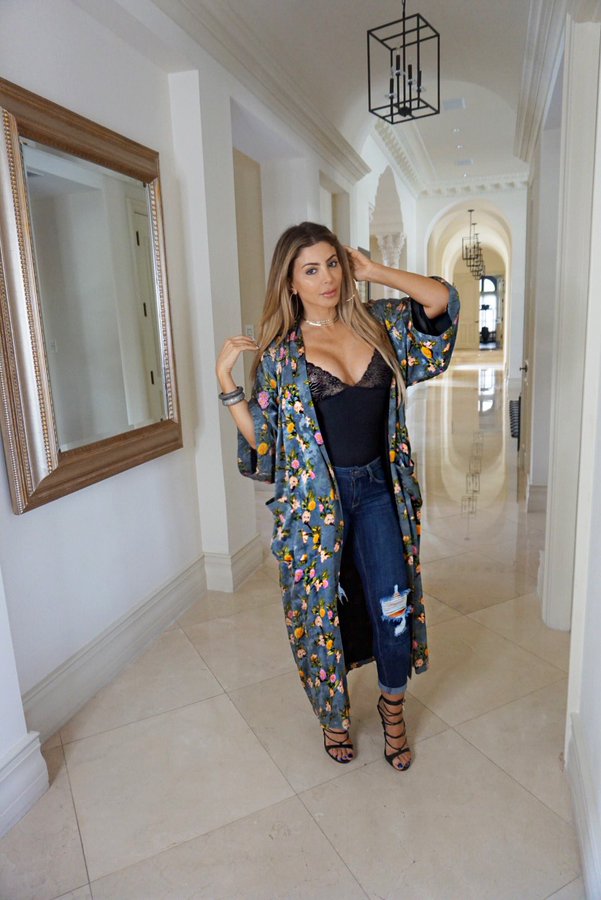 Larsa Pippen wears a black camisole.