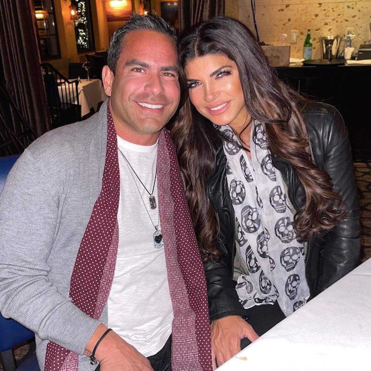 Teresa Giudice wears an Alexander McQueen scarf with boyfriend Luis Ruelas.