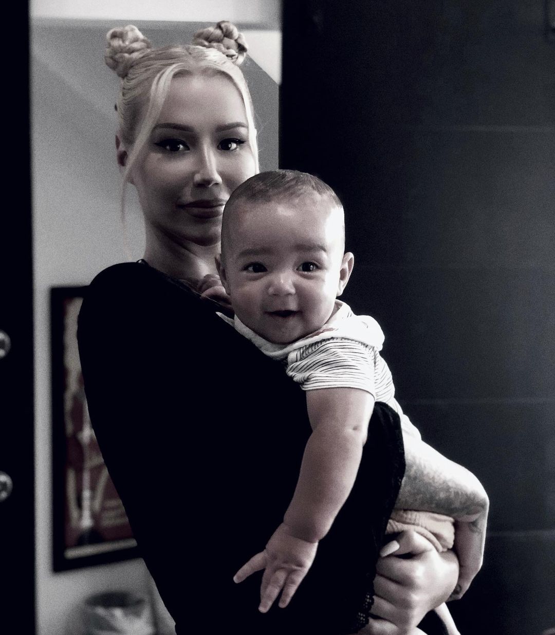 A photo showing baby Onyx with the cutest smile on his face, while on Iggy Azalea's arms.