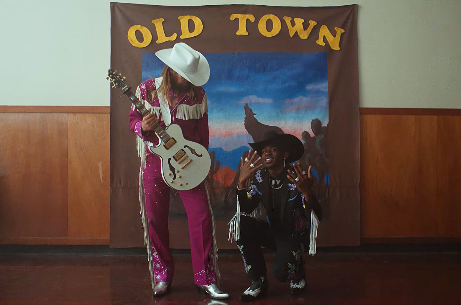 Billy Ray and Nas X pose in their Old Town Road music video.