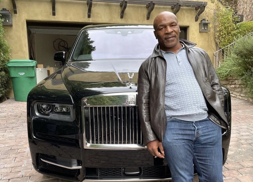 Tyson in front of his Rolls Royce.