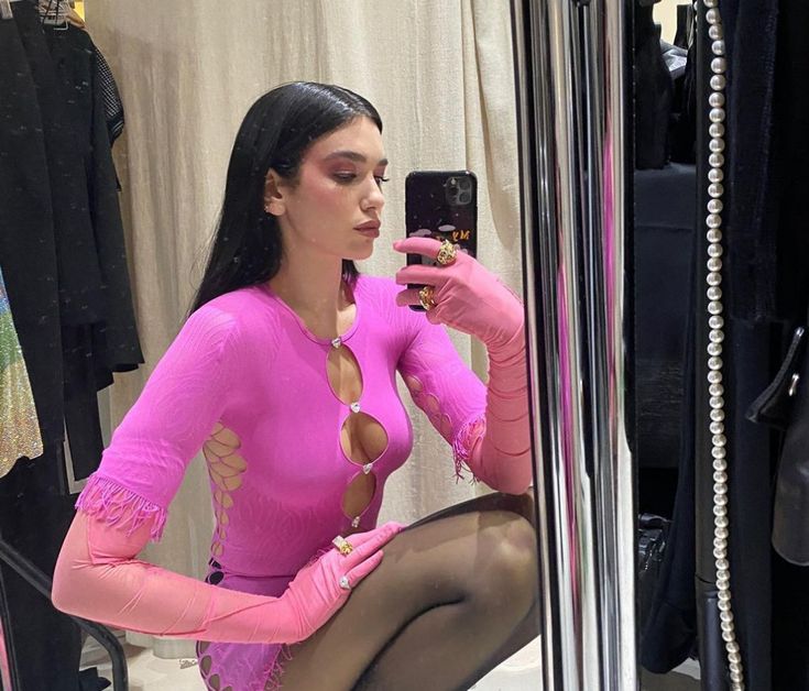 Dua Lipa wearing pink outfit