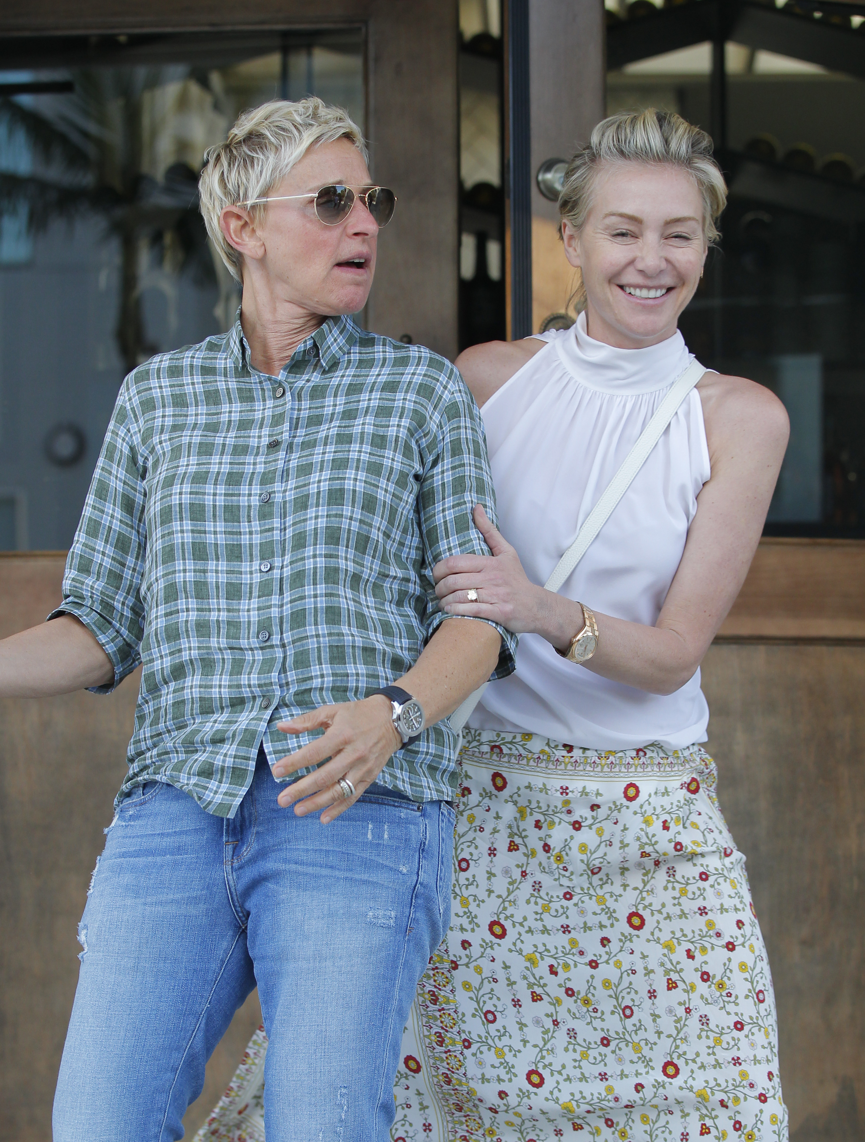 A beautiful photo showing Ellen DeGeneres and her wife, Portia de Rossi goofing around in casual outfits. 