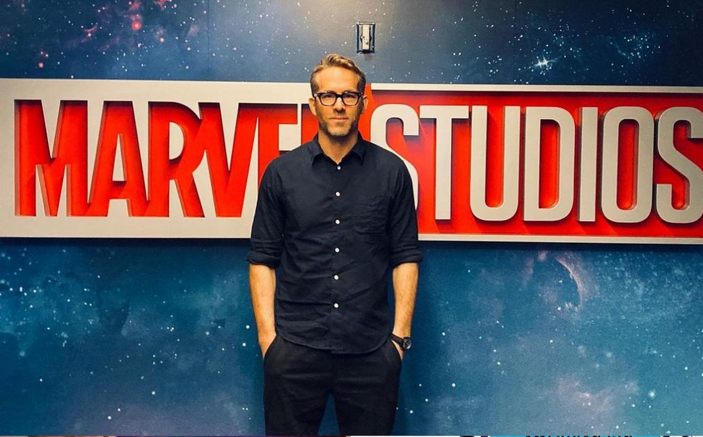 Ryan Reynolds with marvel studios in background