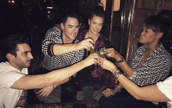 Max Boyens does a cheers with Tom Sandoval and Ariana Madix.