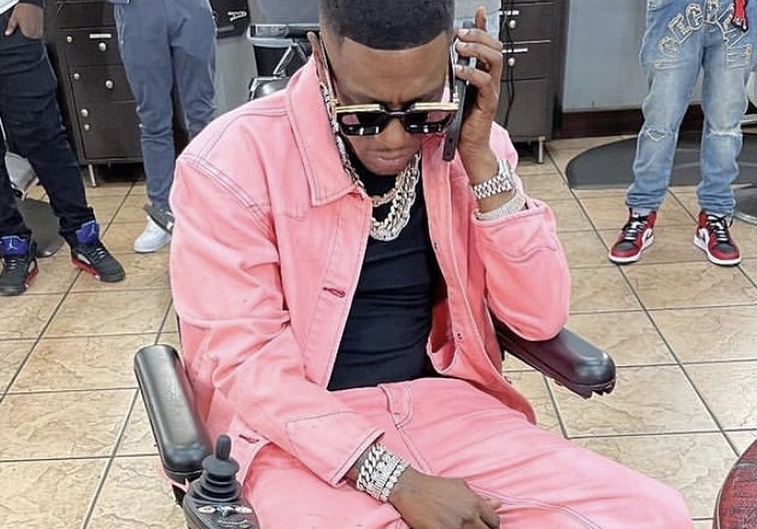 Boosie recovering from his November shooting in his wheelchair. 