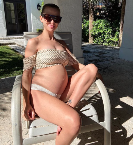 Lala Kent shows off her baby bump in a swimsuit in Miami.