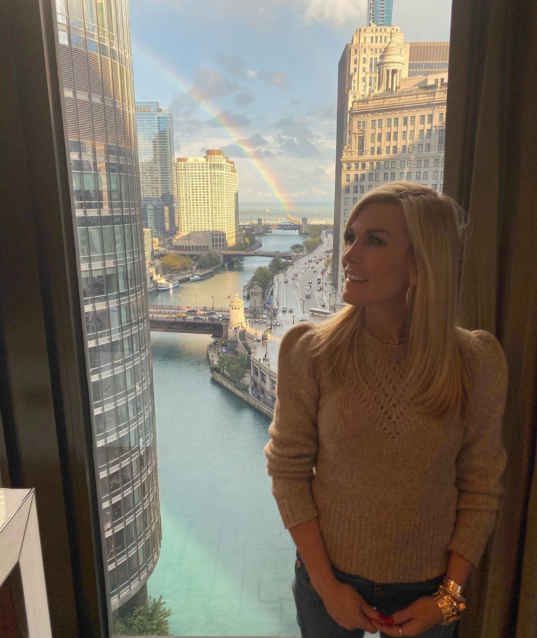 Tinsley Mortimer looks at a rainbow.