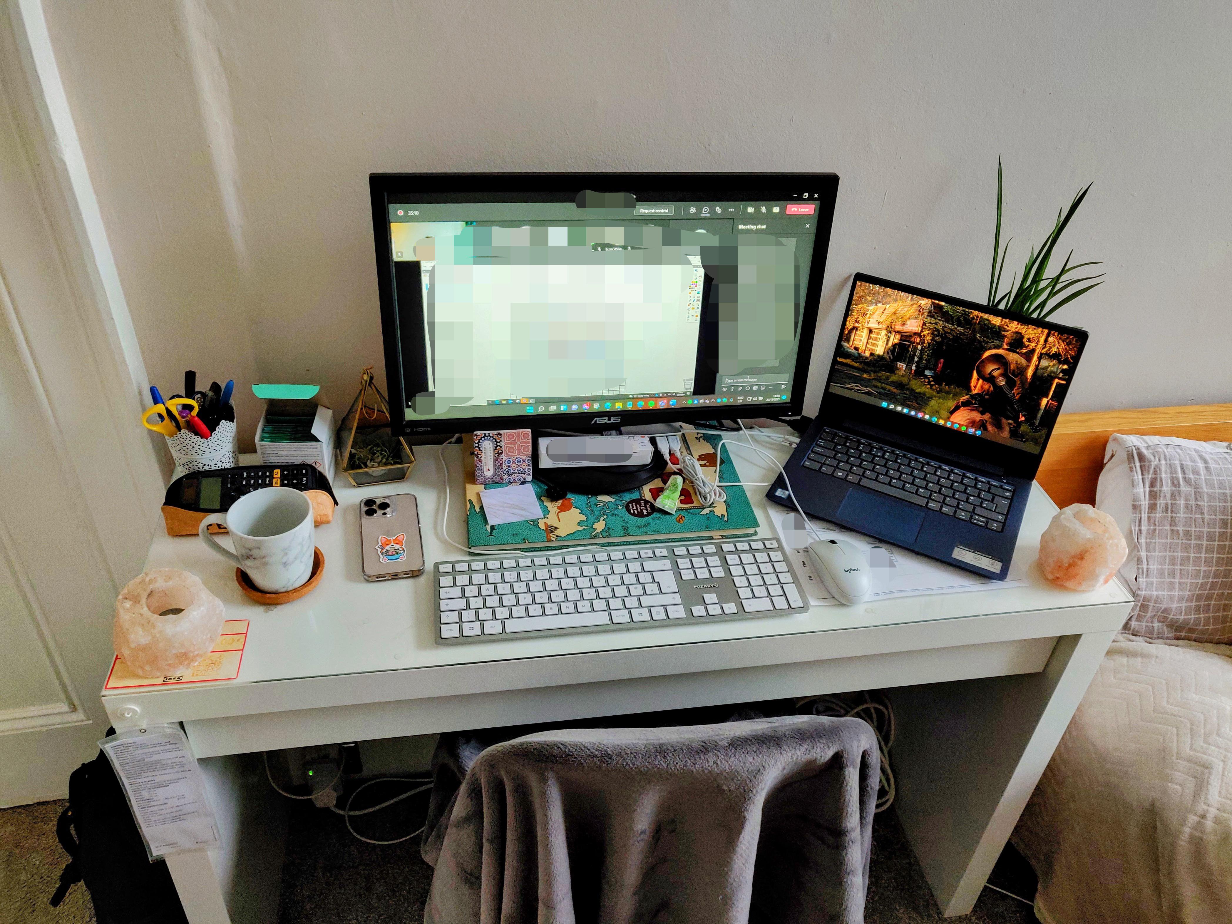 research planning desk with notes and laptop