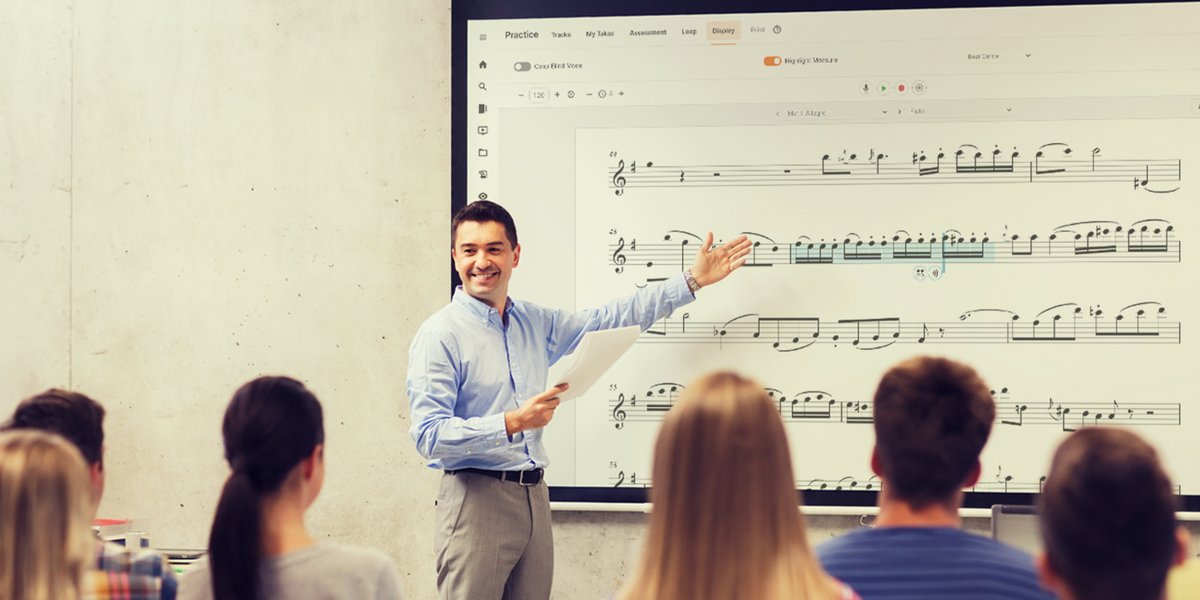 Illustration of music technology in a classroom setting with students using tablets and a teacher at a smartboard.
