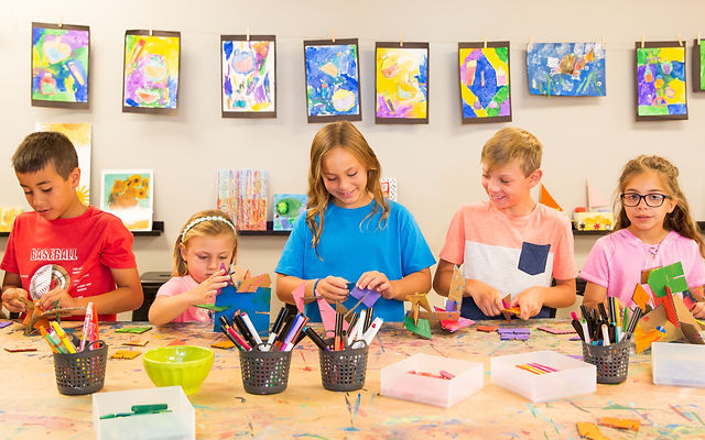 children creating art in school