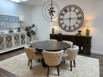 acacia wood round table in a modern living room