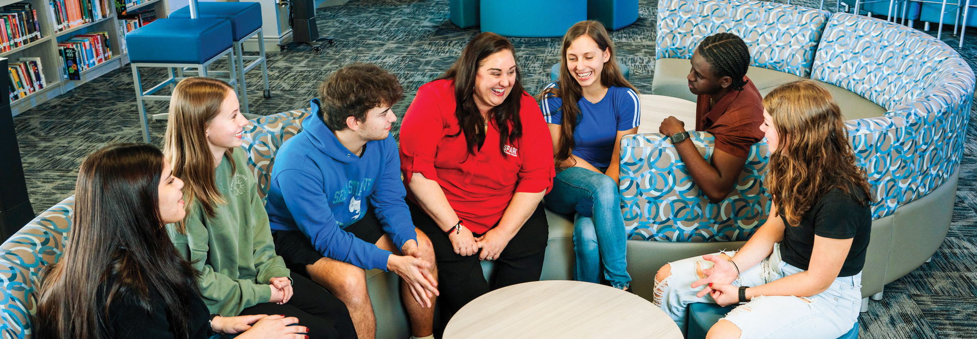 students studying in library with vibrant energy