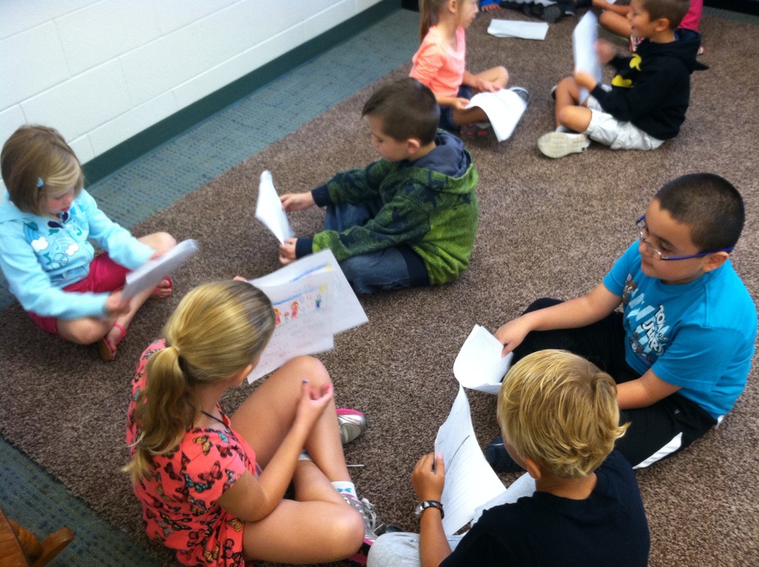 students sharing stories in classroom