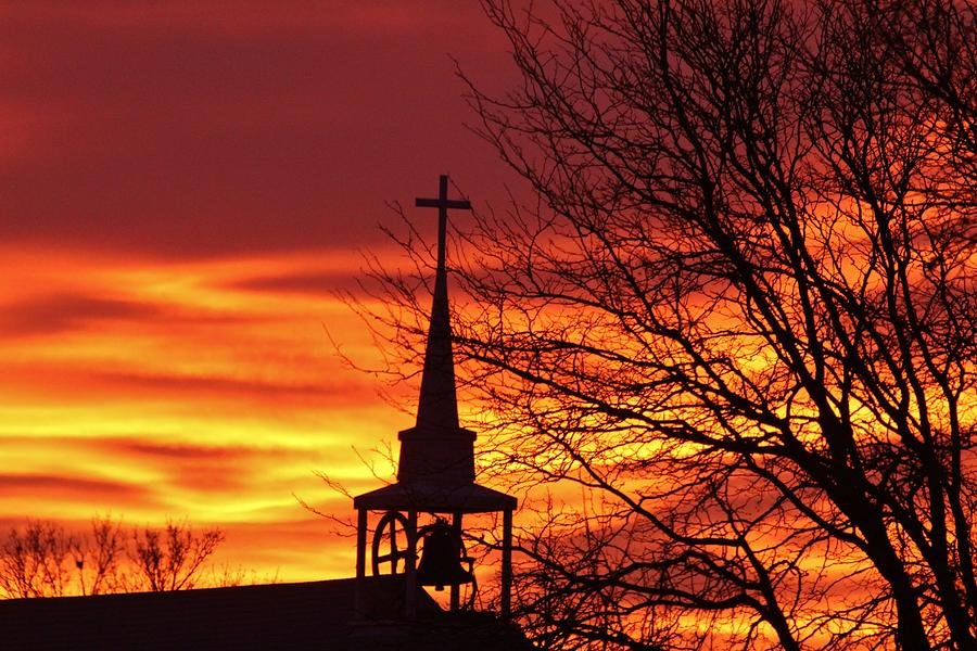 sunrise over church steeple