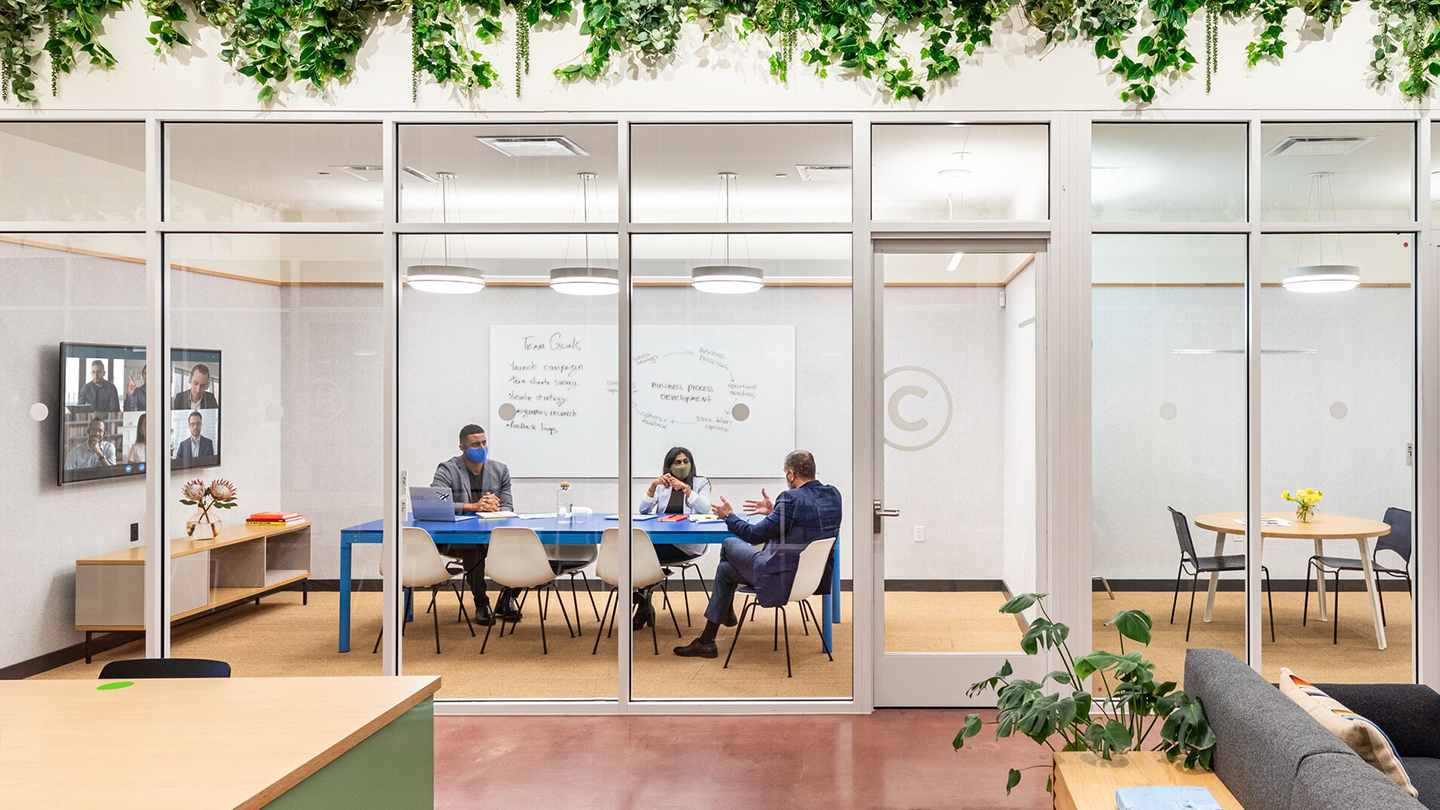 scenic office environment with teamwork and digital devices
