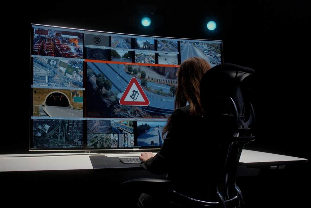 cybersecurity control room with screens