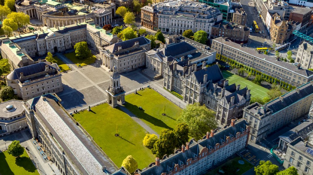 Students walking through Trinity College Dublin campus