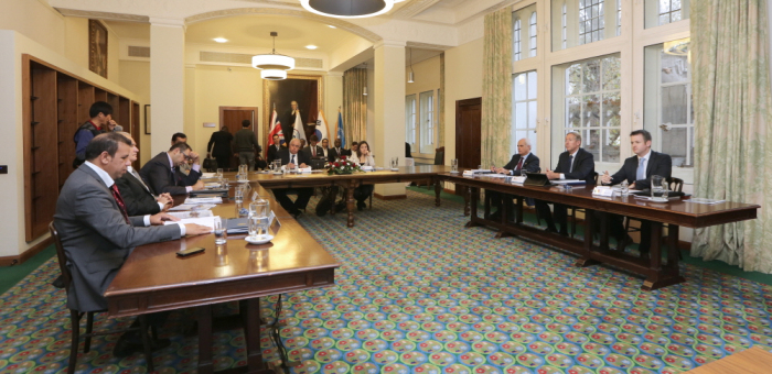 international conflict meeting table discussion