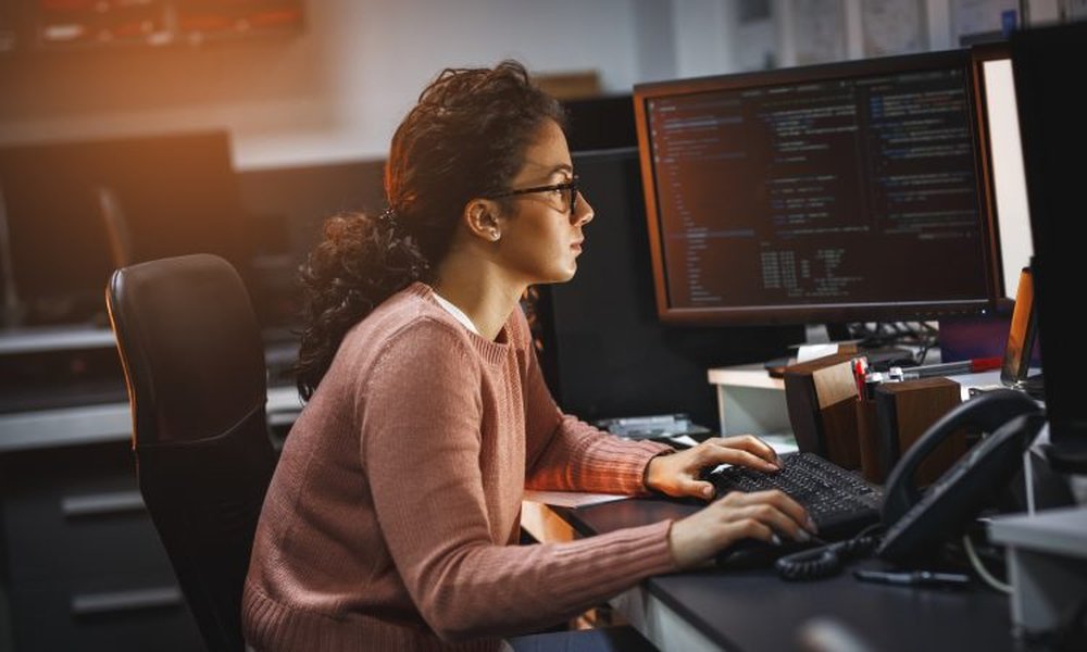Portrait of an AI worker at a computer
