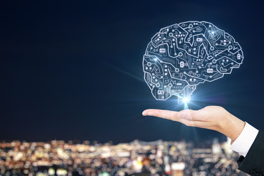 A hand holding a glowing graphic of a brain, symbolizing the fusion of human intellect and AI capability.