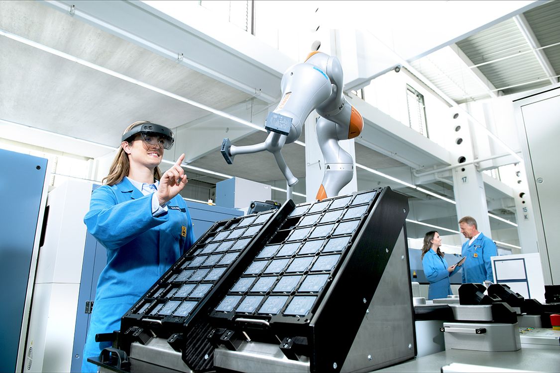 futuristic industrial robotics and digital globe