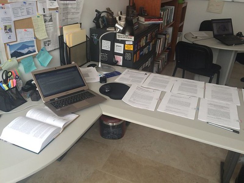 academic writing desk with books