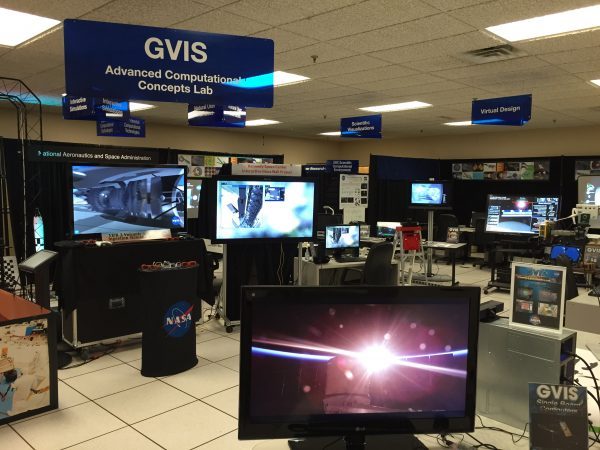 modern research lab with computer screens and data graphs