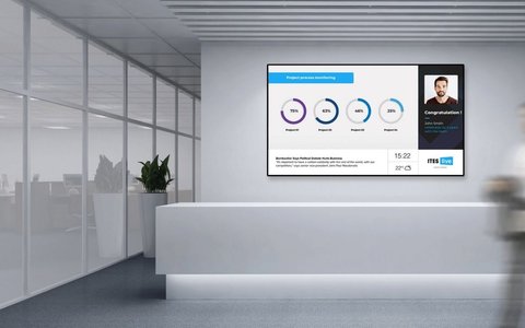 modern software development workspace with digital screens