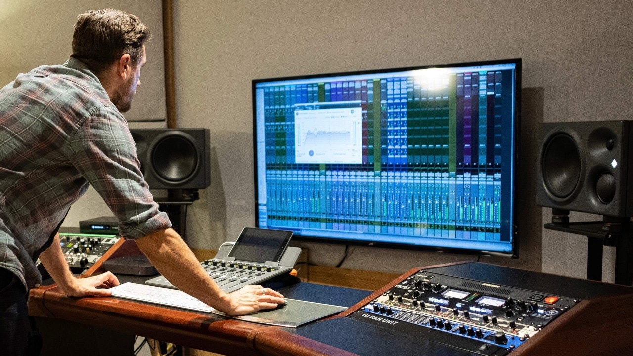 recording studio equipment and research laptop