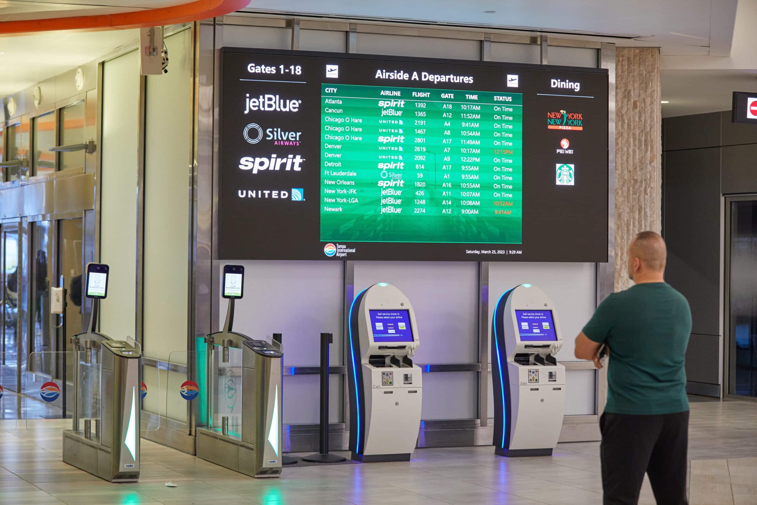 airport terminal with digital boards